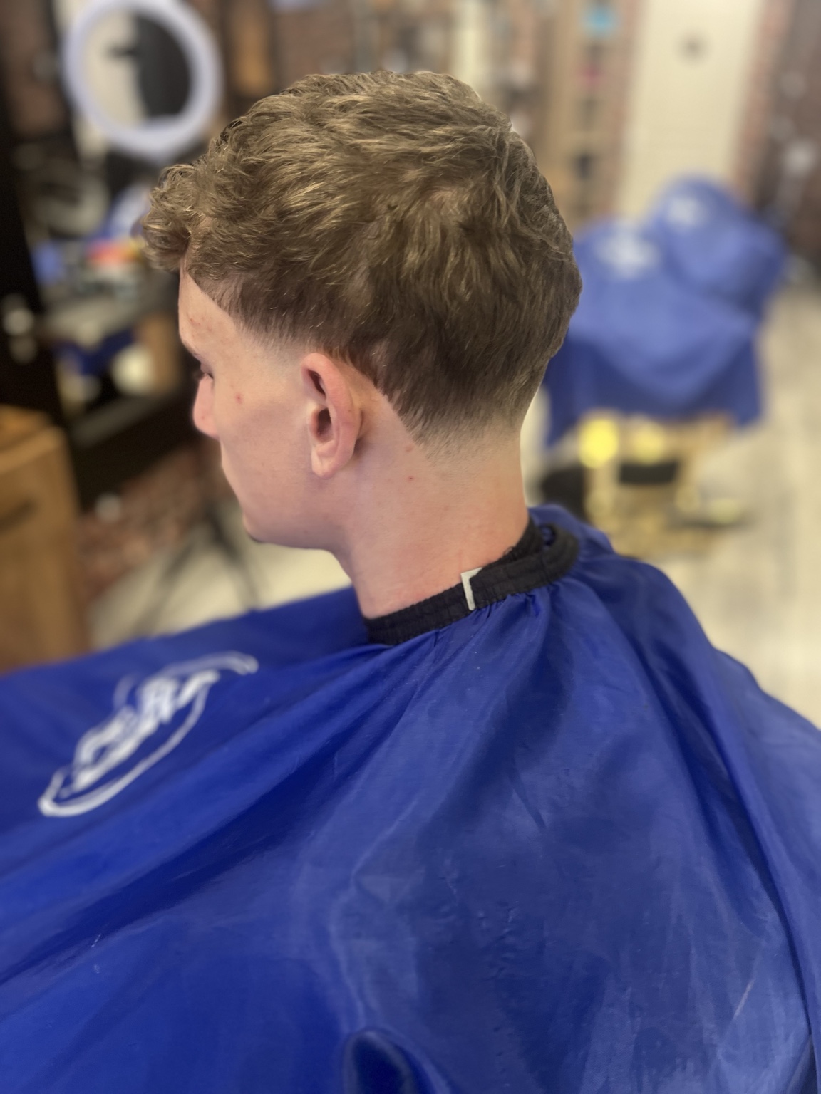 Coupe texturée avec dégradé — réalisation CS Barber